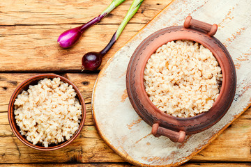 Boiled pearl barley on plate
