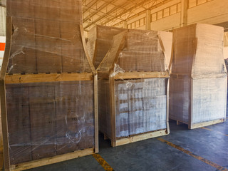 Shipment cartons box on wooden pallets in interior warehouse cargo storage for export and sorting goods in freight logistics and transportation industrial, road truck network