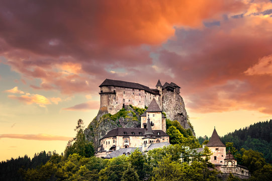 Orava castle in Oravsky Podzamok in Slovakia. Slovakia travel concept. Sun set clouds