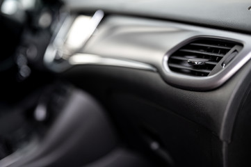 Obraz na płótnie Canvas Modern car interior: steering wheel, gearshift lever, multimedia system.