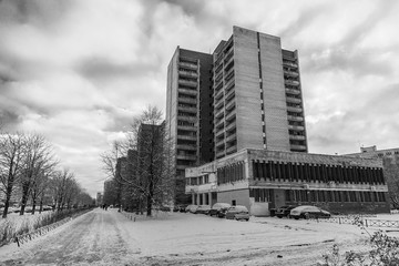 Winter cityscape with old Soviet brick dormitory