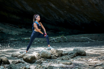 Fitness training. Sport outdoors. Healthy active. Woman in sportswear doing stretching exercises before morning running