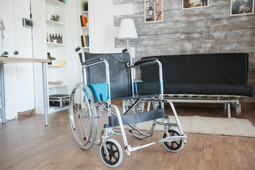 Wheelchair for transportation of patient with walking disability in nursing home. No patient in the room in the private nursing home. Therapy mobility support elderly and disabled walking disability