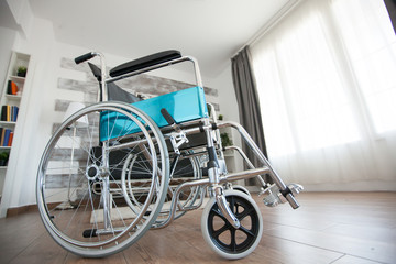 Wheelchair for patient with handicap in nursing home. No patient in the room in the private nursing...