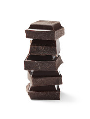 Pieces of delicious dark chocolate isolated on white