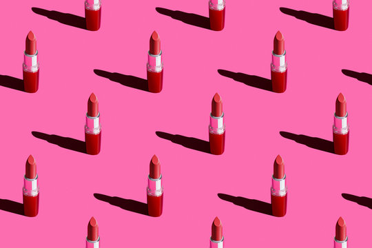 Seamless Pattern Of Red Lipstick On A Pink Background For Print And Advertising