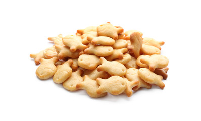 Fototapeta na wymiar Delicious crispy goldfish crackers on white background