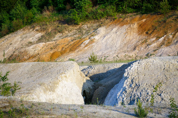 An airy breathtaking view of a picturesque valley with a beautiful coniferous forest and rocky mountains. Amazing atmospheric mountain landscape. Wonderful majestic natural landscapes.