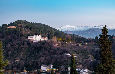 The palace of Generalife and mountains Sierra Nevada