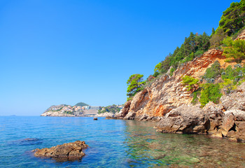Fototapeta na wymiar Adriatic Sea Coast in Croatia . Touristic resort on the rocky seaside 
