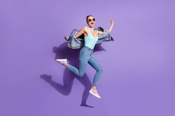 Fototapeta na wymiar Full length body size view of nice attractive pretty funny girlish free cheerful girl jumping having fun weekend isolated on bright vivid shine vibrant lilac purple violet color background