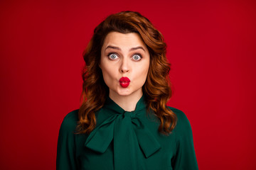 Close-up portrait of her she nice-looking attractive lovable pretty wavy-haired girl sending air kiss isolated over bright vivid shine vibrant red maroon burgundy marsala color background