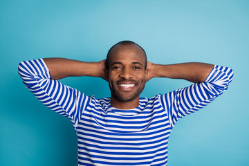 Top above high angle view photo of content candid imposing afro american guy have free time holiday rest relax day dreaming wear nautical vest isolated over blue color background