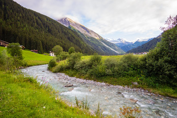 View to Tuxertal valley with Tux river and Zillertal alps near village Juns and Hintertux glacier in summer, Tirol Austria Europe