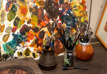 Used brushes in the studio of the artist painter