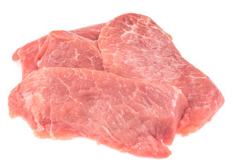 Slice of raw pork meat isolated on white background. schnitzel. steak. meat tenderloin