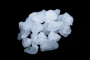 Potassium nitrate isolated on black background.