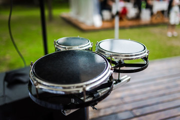 Drums on a stage close up photo.