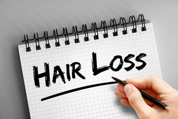 Hair Loss text on notepad, health concept background