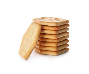 Stack of delicious crispy crackers isolated on white