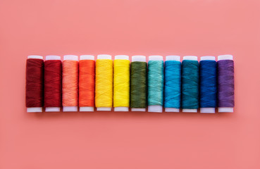 Spools of thread on the colors of the rainbow