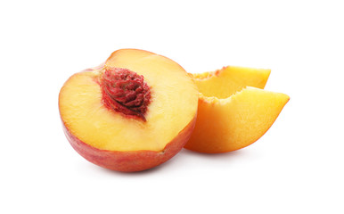Cut fresh ripe peach isolated on white