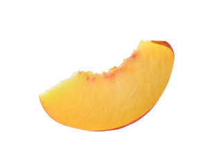 Slice of ripe peach isolated on white