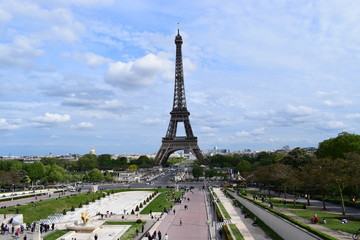 PARIS, FRANCE - APRIL 28, 2018: Beautiful view of the Eiffel Tower (Tour Eiffel) in a sunny spring day - Breathtaking view of the most known monument of Paris