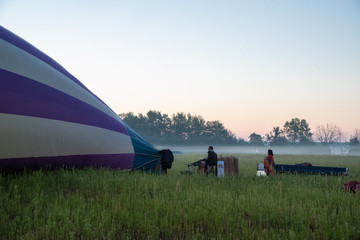 air balloon on the field in the morning