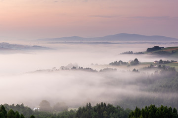Panoramic View over Rolling Hills in Morning Fog at Sunrise. Lesser Poland.