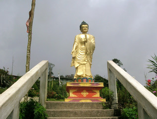The statue of Lord Buddha shines bright at Gumba Dara in Kalimpong, India. This place famous for its natural beauty and the most popular tourist destinations in Kalimpong.