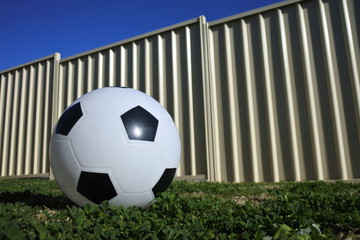 Football on home lawn backyard