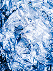 crumpled paper texture.crumpled aluminum foil.Metallic silver foil texture. Shiny backdrop. Foil.