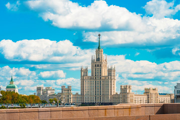 Fototapeta na wymiar River bridge high-rise building blue sky. in Moscow