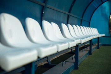 Coach and reserve benches in a soccer field
