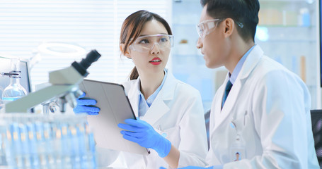 asian scientist team meeting