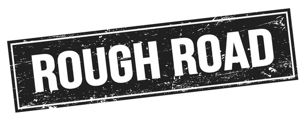 ROUGH ROAD text on black grungy rectangle stamp.