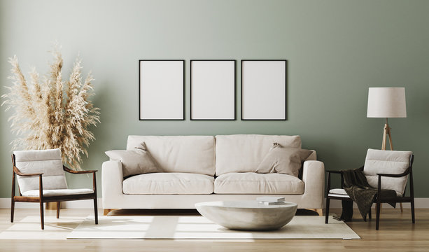 Blank three poster frames mock up in pastel green room interior , 3d rendering
