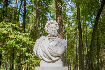 White monument to the world famous great russian poet Alexander Pushkin. The territory of the park of the museum-estate Arkhangelskoye. Krasnogorsk, Russia