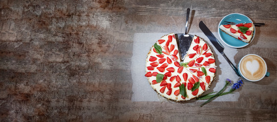 Delicious cheesecake with strawberries, bio homemade strawberries from garden, layout