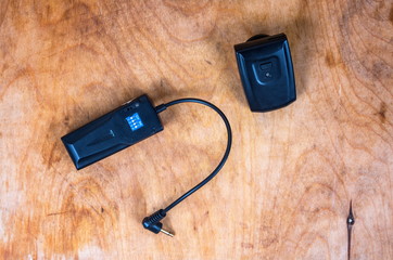 Studio flash transmitter and receiver on table