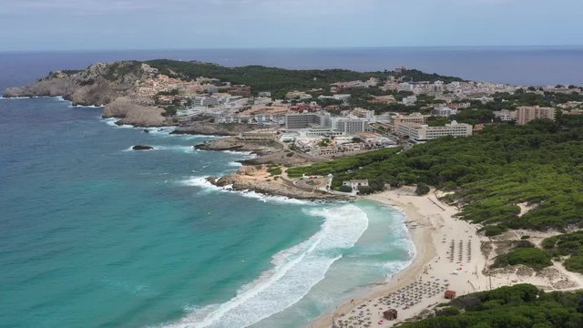 Flying a drone over the beach of Cala Agulla in the northeast of the island of Majorca Spain