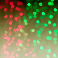 Multi-colored defocused background  with lantern lights and garlands. Bokeh and blur effect. Defocused. Christmas, New year and other holliday mood.