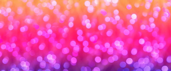 Multi-colored defocused background  with lantern lights and garlands. Bokeh and blur effect. Defocused. Christmas, New year and other holliday mood.