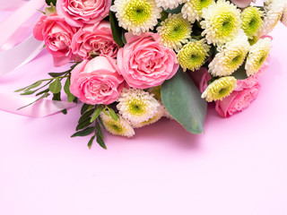 Wedding bouquet on a pink background.