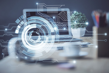 Double exposure of desktop computer and technology theme hologram. Concept of software development.