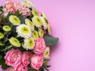 Wedding bouquet on a pink background.