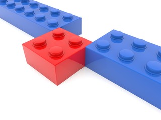A red toy brick has been pushed out of a row of blue toy bricks