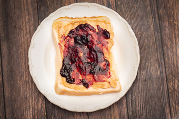 Peanut Butter and jelly sandwich on a plate