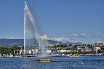 Naklejka na ściany i meble the water jet fountain and the famous yellow boats on, lake geneva, switzerland.